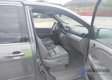 2010 Honda Odyssey Ex-L z USA, uszkodzony, nr VIN 5FNRL3H67AB507375